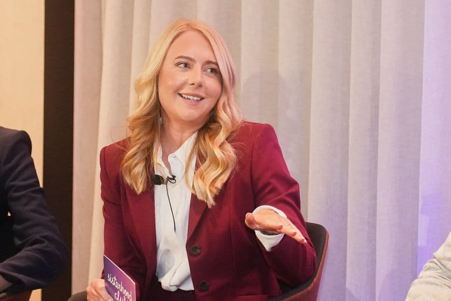 Georgie Hubbard speaking on stage